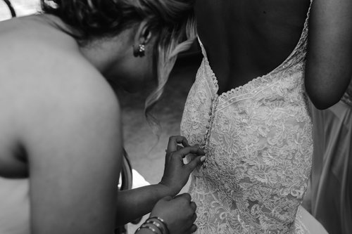 zipping the dress