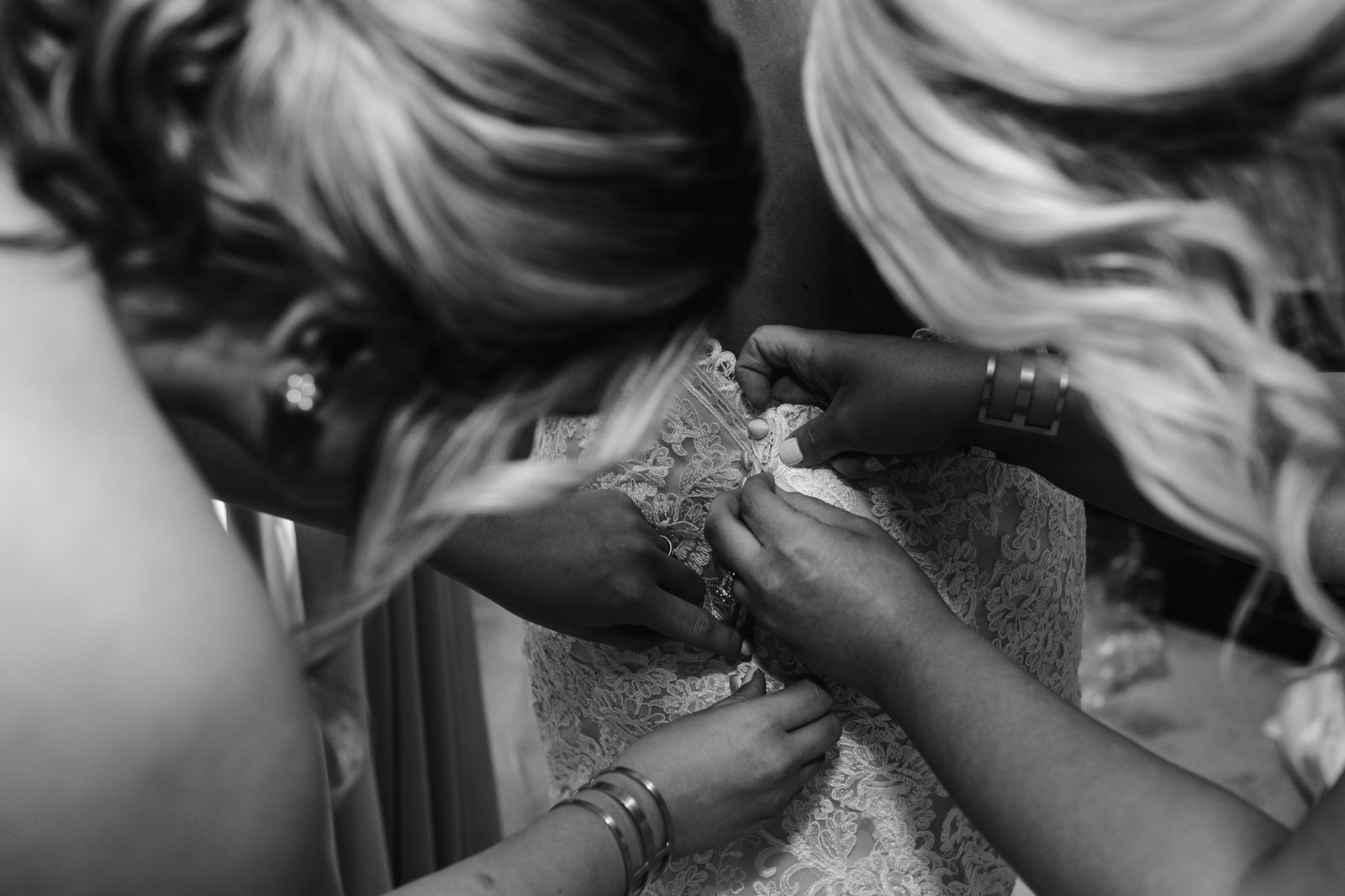 buttoning the dress