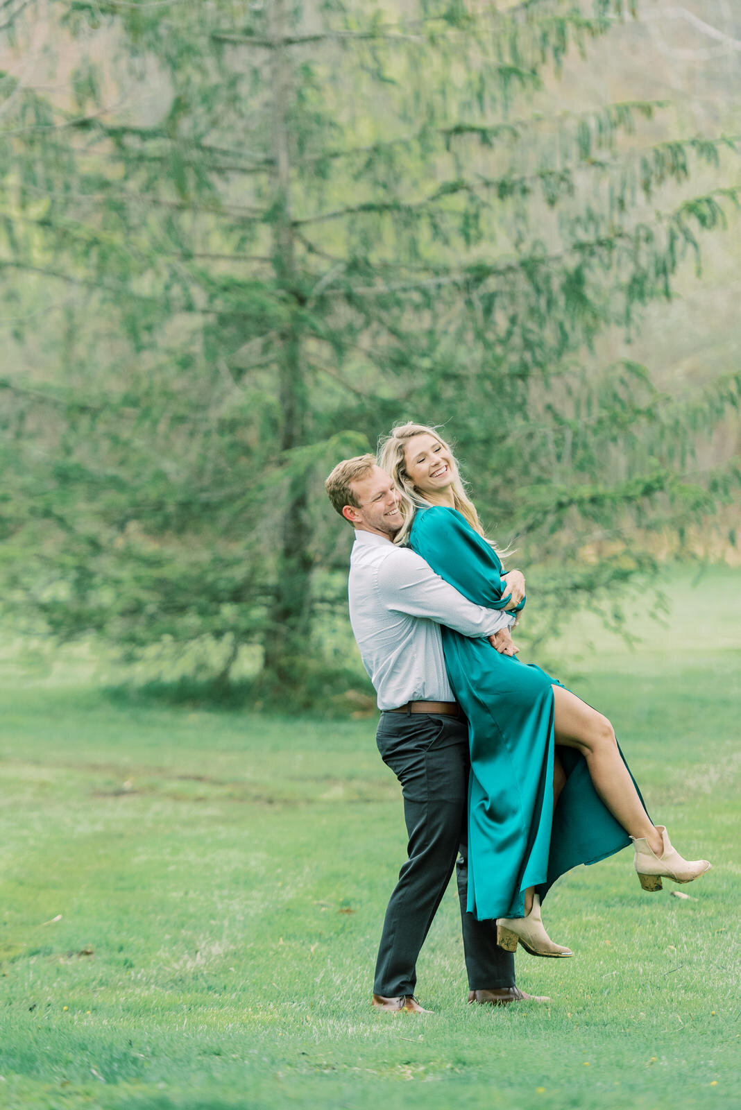  Playful couple has fun durning their Engagement photos taken at Westmoreland County 